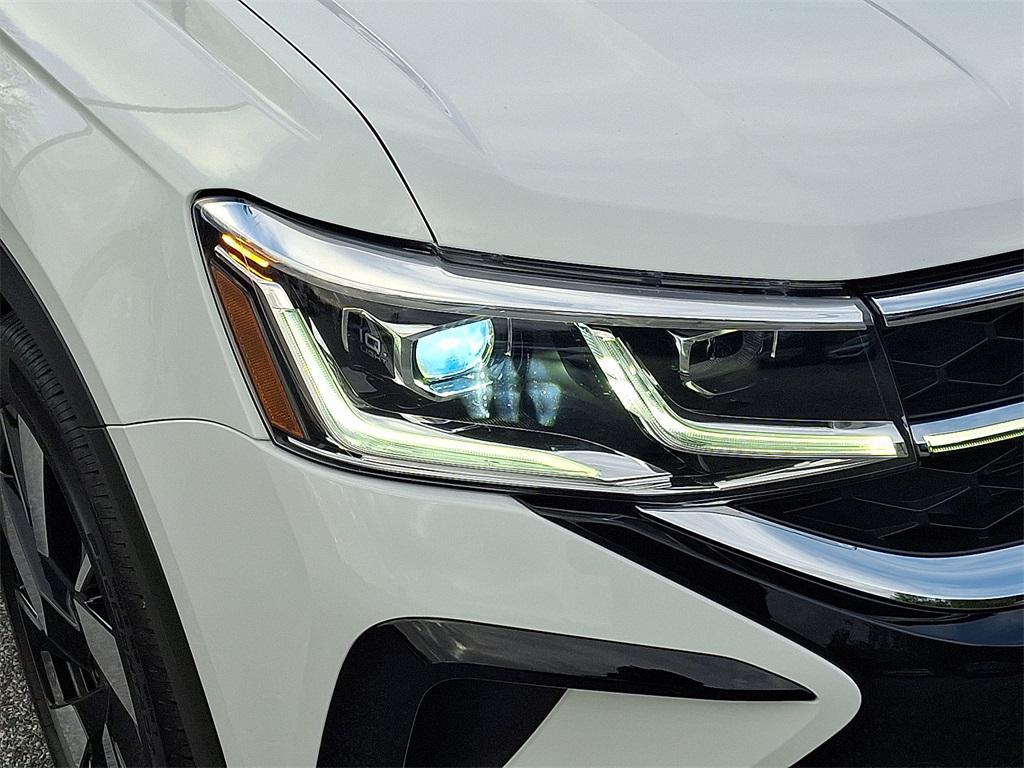 used 2024 Volkswagen Taos car, priced at $26,000