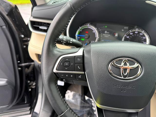used 2023 Toyota Highlander Hybrid car, priced at $36,885