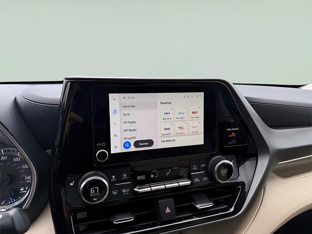used 2023 Toyota Highlander Hybrid car, priced at $36,885
