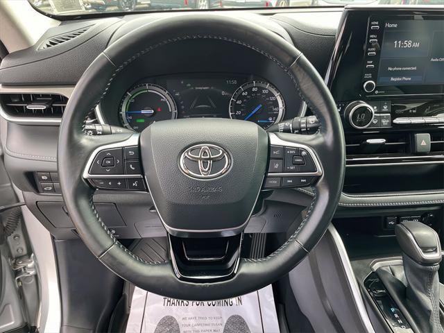 used 2021 Toyota Highlander Hybrid car, priced at $35,495