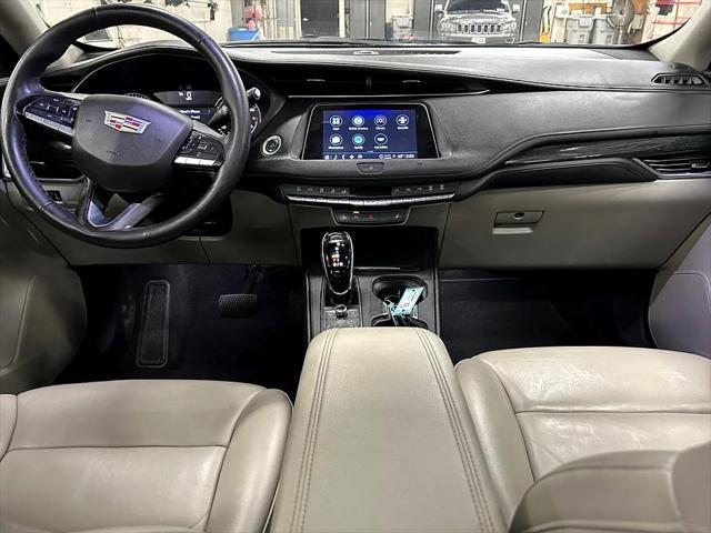 used 2021 Cadillac XT4 car, priced at $27,892