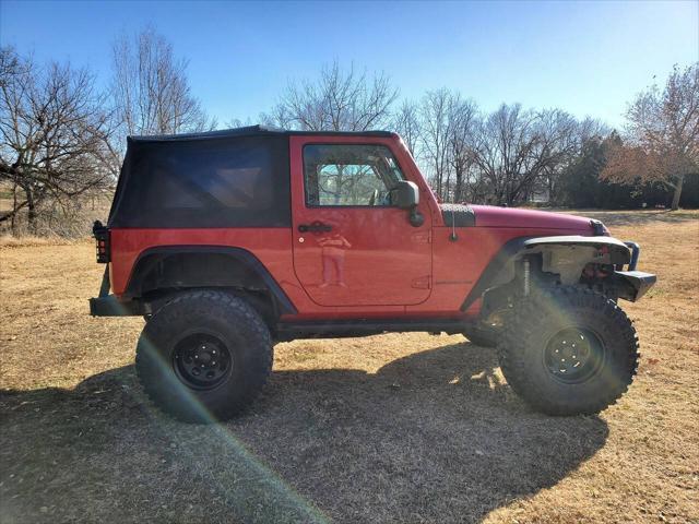 used 2013 Jeep Wrangler car, priced at $17,900