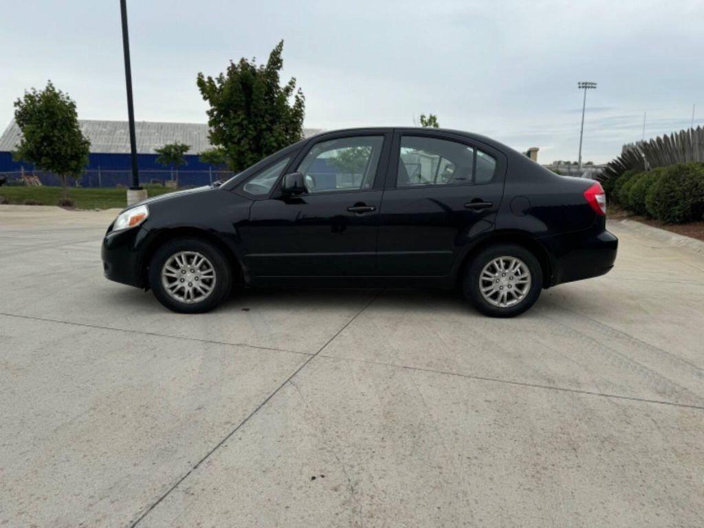 used 2012 Suzuki SX4 car, priced at $4,995