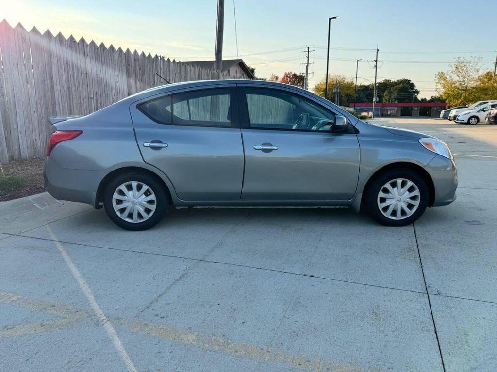 used 2013 Nissan Versa car, priced at $6,795