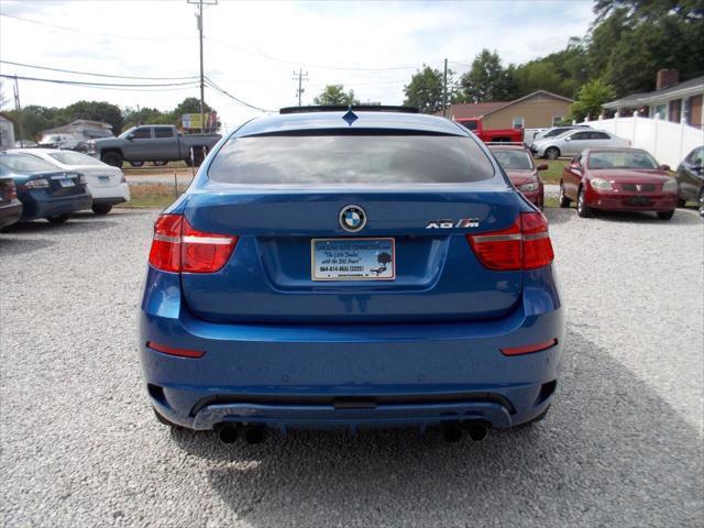 used 2011 BMW X6 M car, priced at $16,990