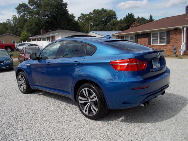 used 2011 BMW X6 M car, priced at $16,990