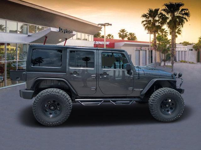 used 2018 Jeep Wrangler JK Unlimited car, priced at $23,999