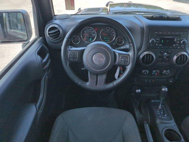 used 2018 Jeep Wrangler JK Unlimited car, priced at $23,999