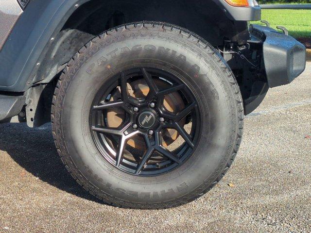 used 2024 Jeep Wrangler car, priced at $33,785