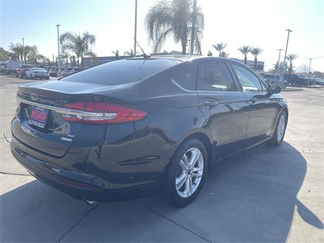 used 2018 Ford Fusion car, priced at $13,999