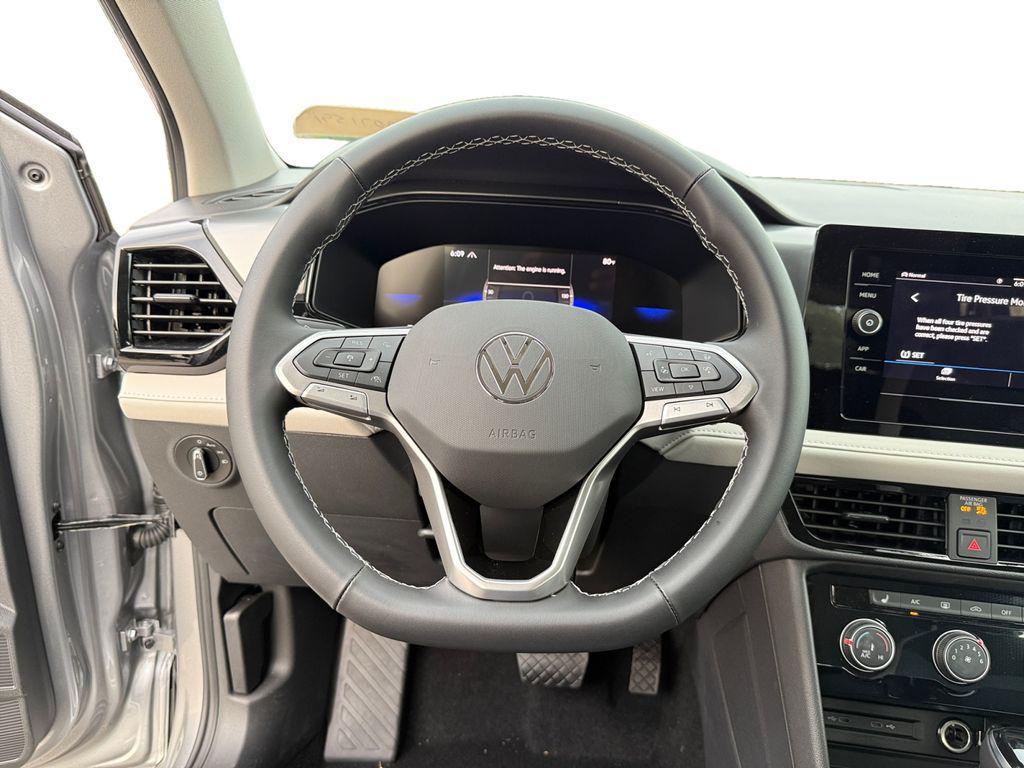 new 2025 Volkswagen Taos car, priced at $27,010