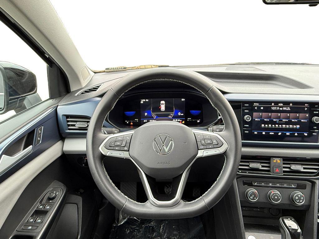used 2022 Volkswagen Taos car, priced at $19,000