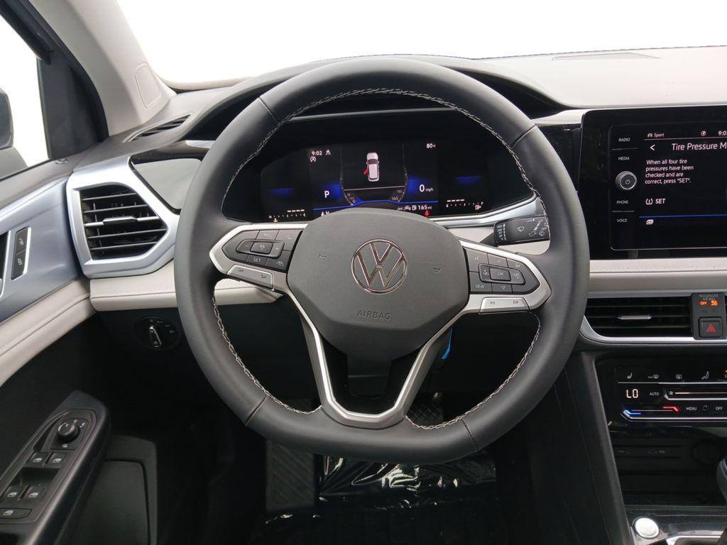 new 2025 Volkswagen Taos car, priced at $31,674