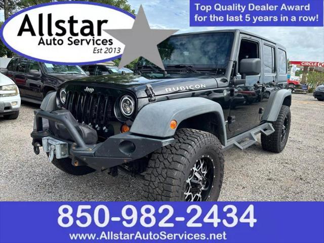 used 2012 Jeep Wrangler Unlimited car, priced at $16,900