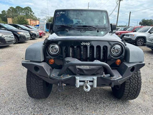 used 2012 Jeep Wrangler Unlimited car, priced at $16,900