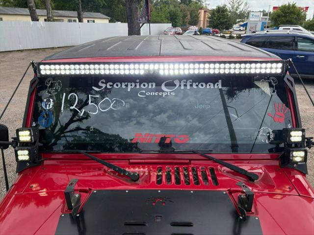 used 2012 Jeep Wrangler Unlimited car, priced at $12,500