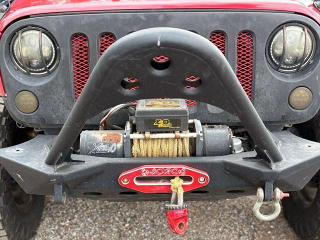 used 2012 Jeep Wrangler Unlimited car, priced at $12,500