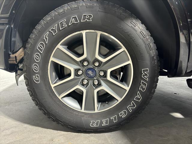 used 2015 Ford F-150 car, priced at $23,208