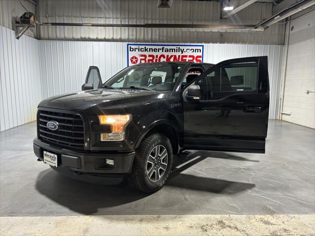 used 2015 Ford F-150 car, priced at $23,208