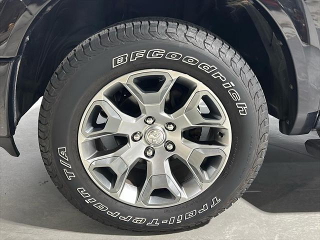 used 2018 Ram 1500 car, priced at $28,728