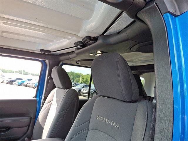 used 2021 Jeep Wrangler Unlimited car, priced at $30,599