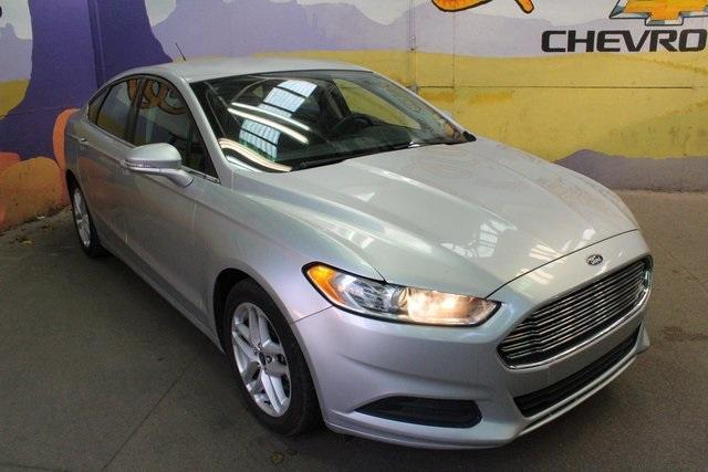 used 2016 Ford Fusion car, priced at $12,900