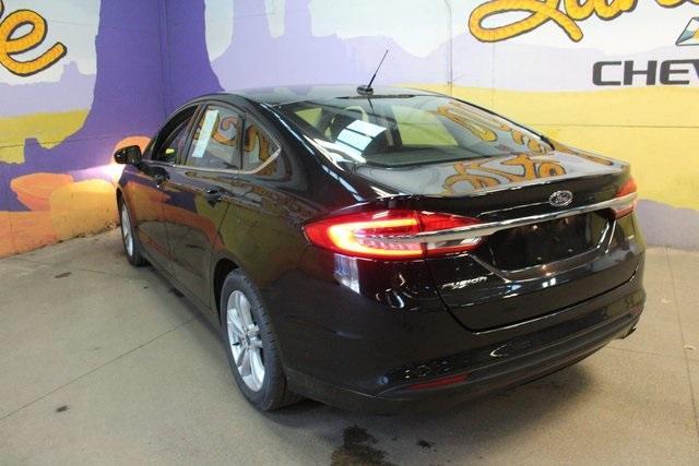 used 2018 Ford Fusion car, priced at $13,700