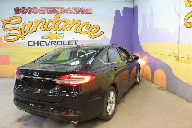 used 2018 Ford Fusion car, priced at $13,700