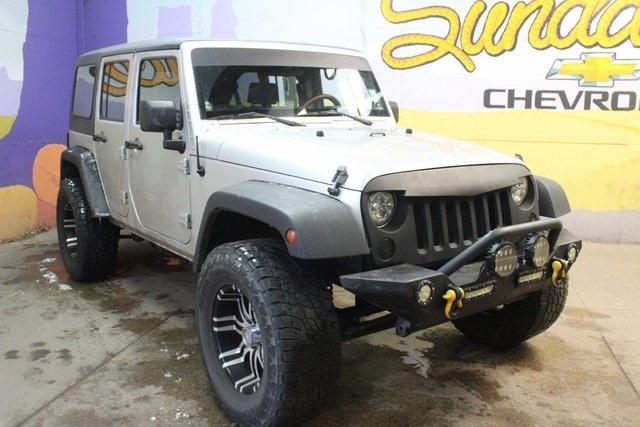 used 2010 Jeep Wrangler Unlimited car, priced at $11,700