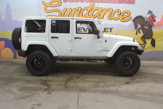 used 2012 Jeep Wrangler Unlimited car, priced at $18,600