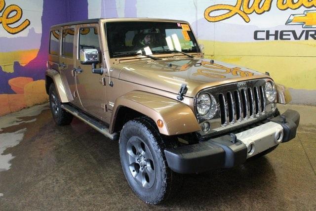 used 2015 Jeep Wrangler Unlimited car, priced at $23,900