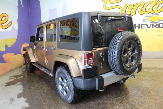 used 2015 Jeep Wrangler Unlimited car, priced at $23,900