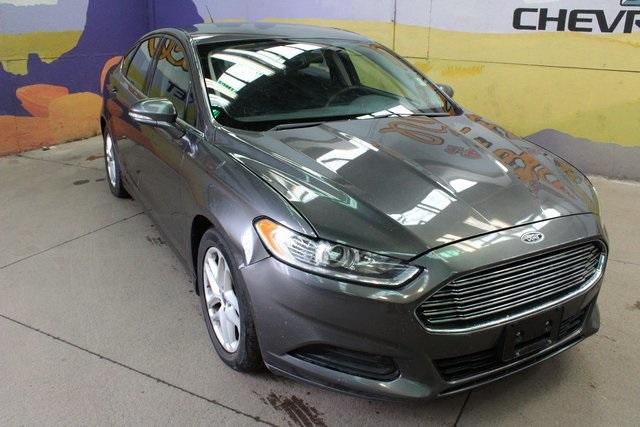 used 2016 Ford Fusion car, priced at $10,900