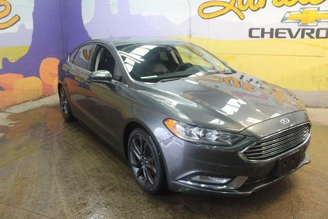 used 2018 Ford Fusion car, priced at $13,900