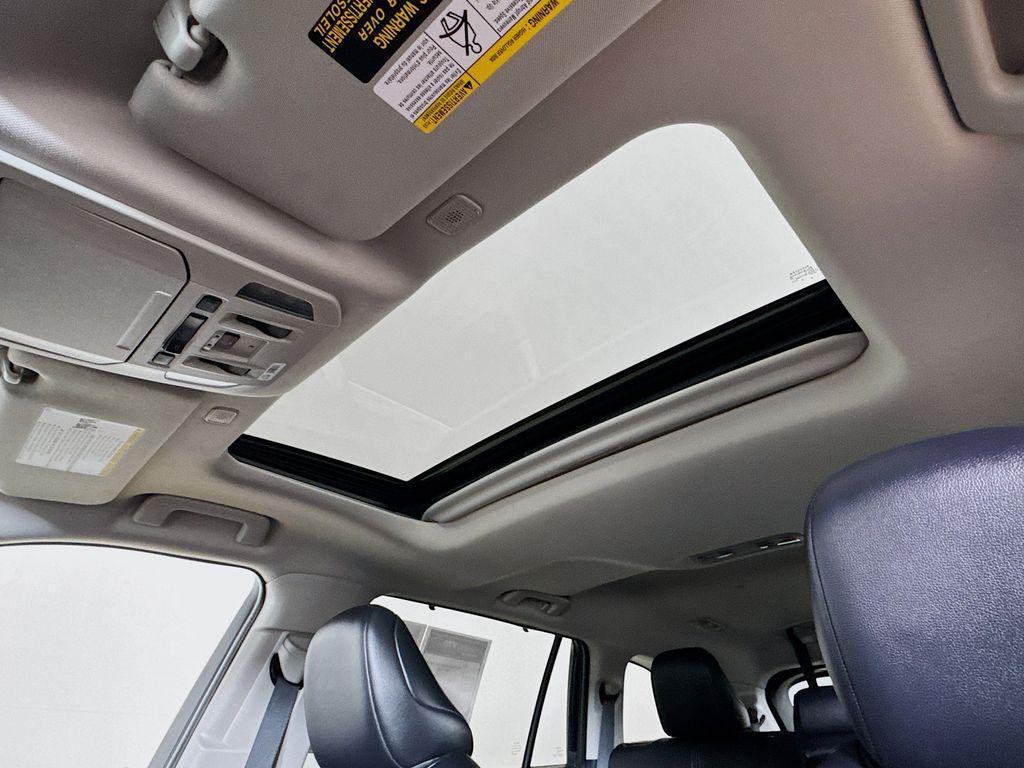 used 2024 Toyota Highlander Hybrid car, priced at $48,897