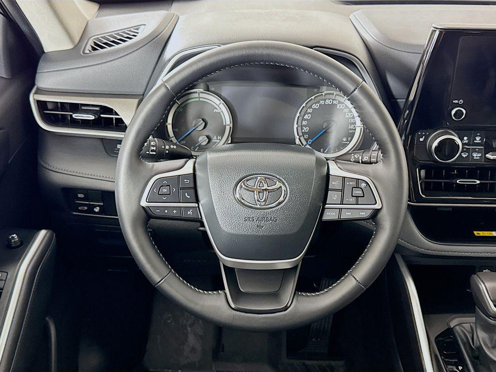 used 2024 Toyota Highlander Hybrid car, priced at $48,897