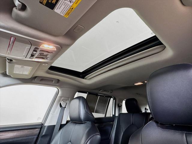 used 2024 Toyota Highlander Hybrid car, priced at $51,499