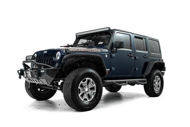 used 2013 Jeep Wrangler Unlimited car, priced at $21,991