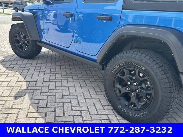 used 2023 Jeep Wrangler car, priced at $28,885