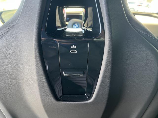 new 2024 BMW iX car, priced at $70,000