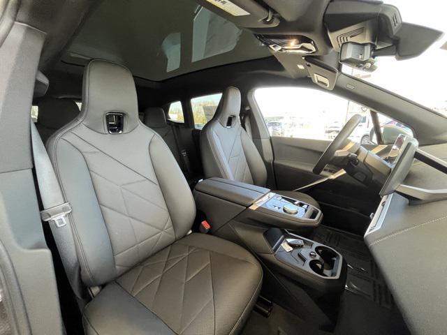 new 2024 BMW iX car, priced at $70,000