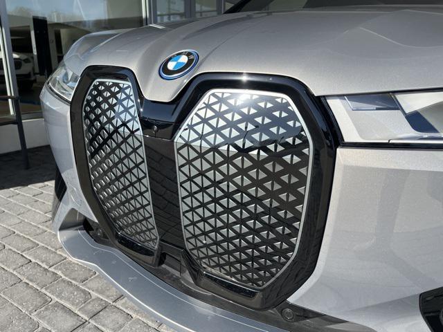 new 2024 BMW iX car, priced at $70,000