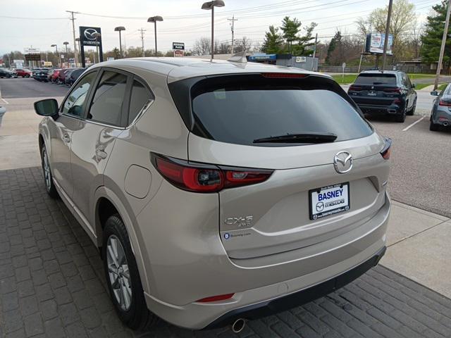 used 2024 Mazda CX-5 car, priced at $28,000