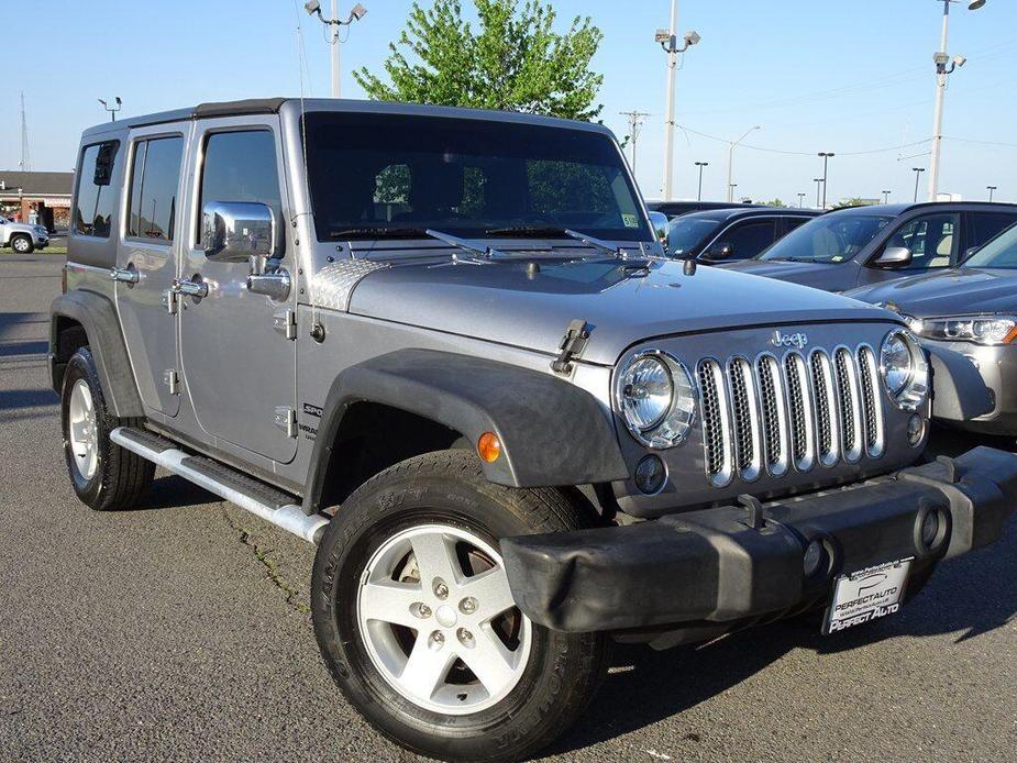used 2017 Jeep Wrangler Unlimited car, priced at $21,444
