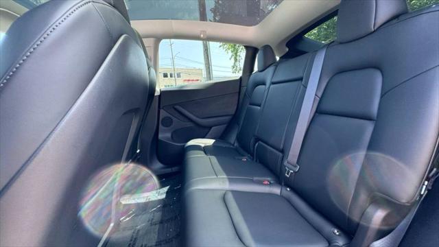 used 2021 Tesla Model Y car, priced at $32,997