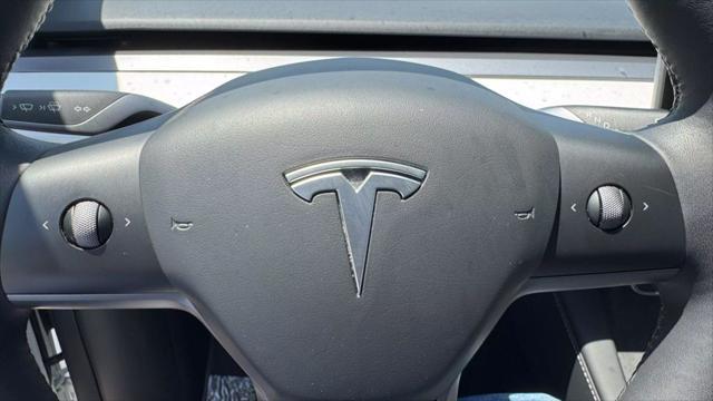 used 2023 Tesla Model Y car, priced at $29,997