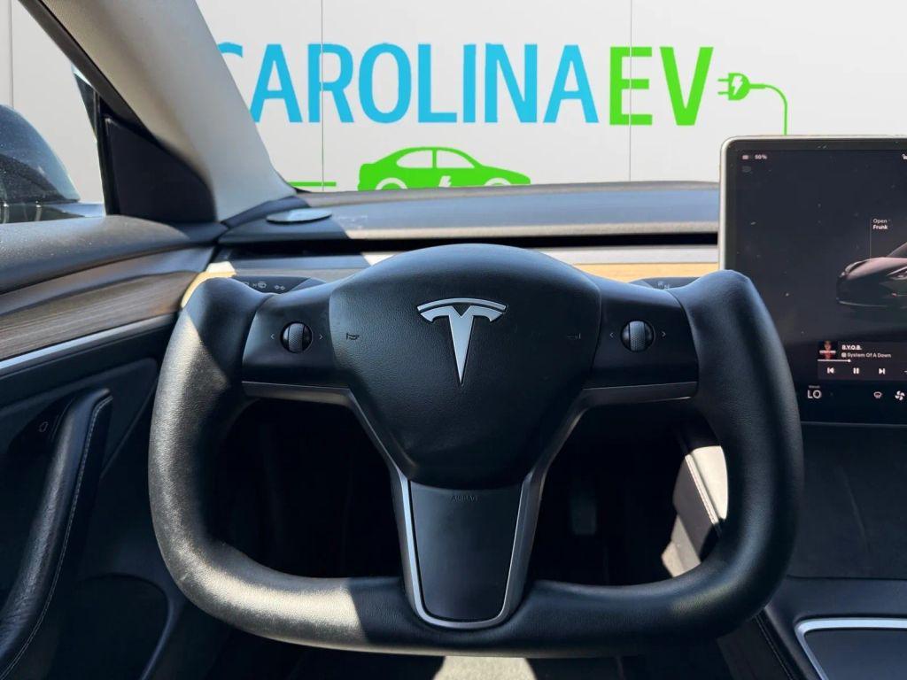 used 2022 Tesla Model 3 car, priced at $17,500