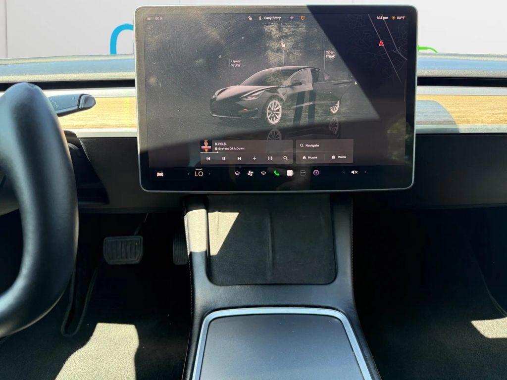 used 2022 Tesla Model 3 car, priced at $17,500