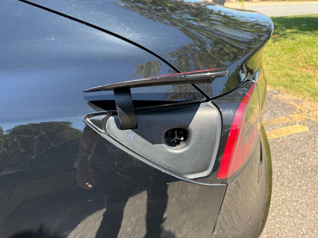 used 2022 Tesla Model 3 car, priced at $17,500