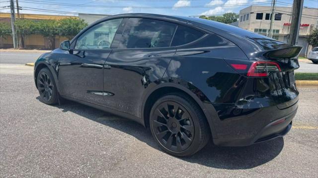 used 2022 Tesla Model Y car, priced at $21,000